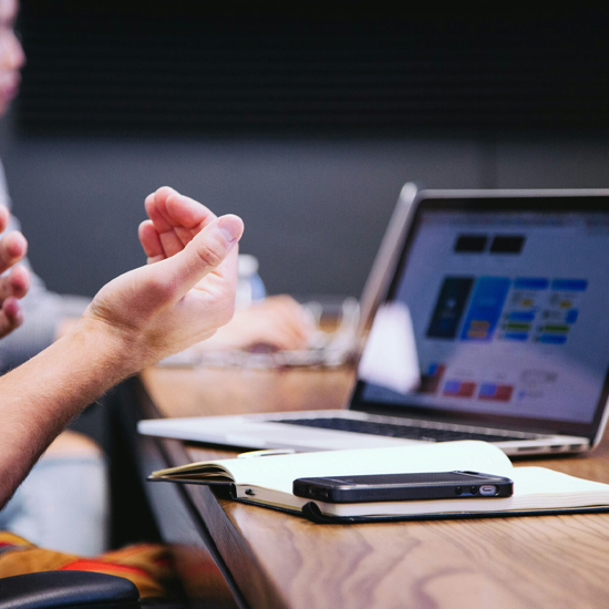 Dev Tech Solutions | an image showing a person working on a laptop