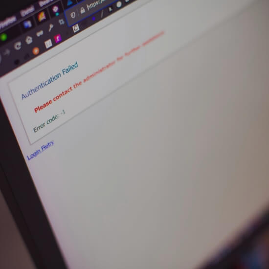 Dev Tech Solutions | Computer screen showing an authentication error message and failed login notification.